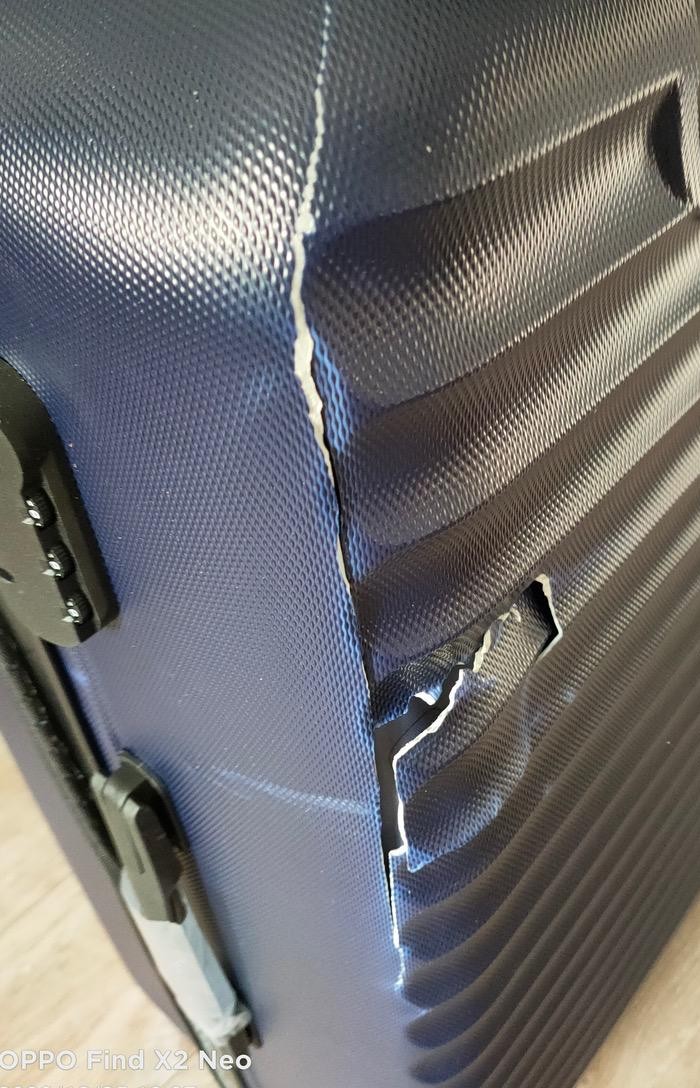 Fissure structurelle sur coque de valise